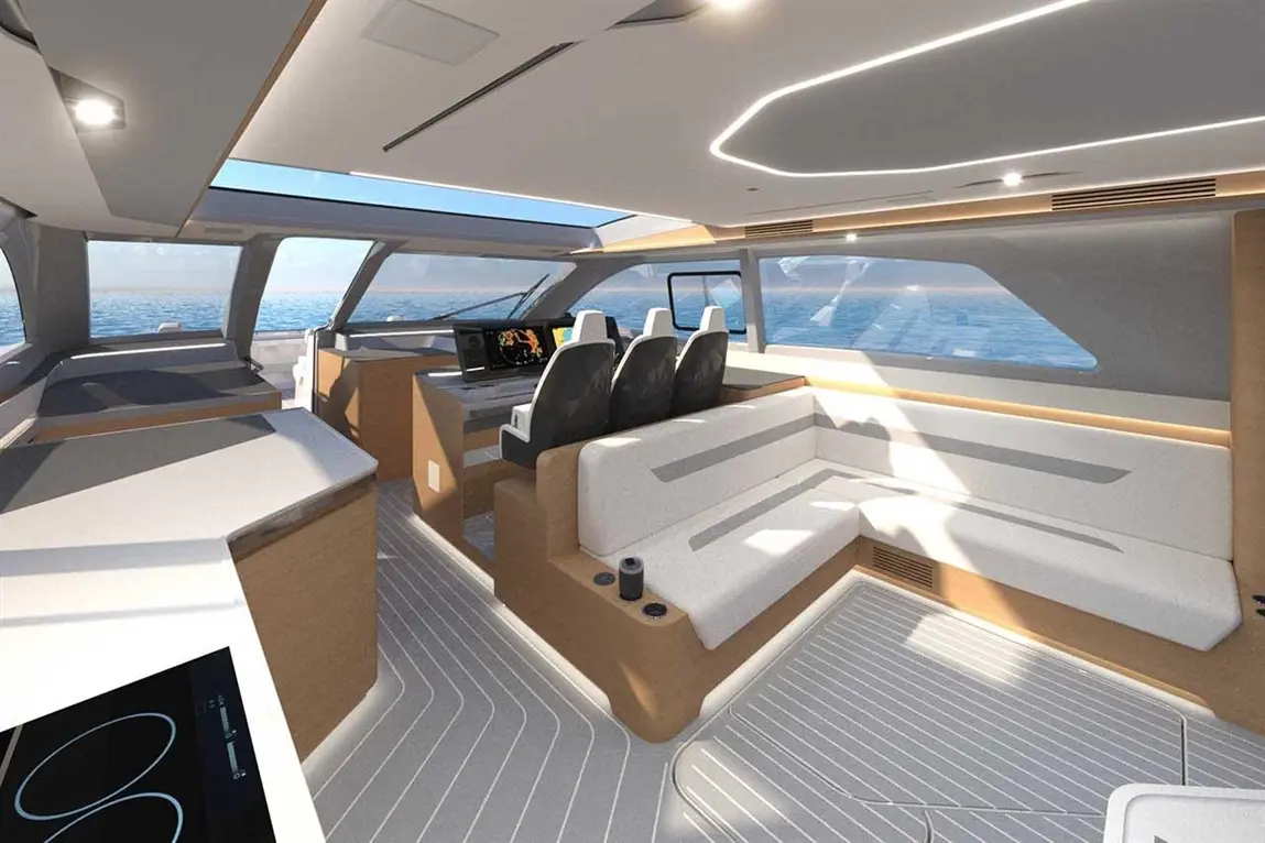 Modern yacht interior with sleek furnishings, large windows, and a navigation panel, showcasing spacious seating and marine views.
